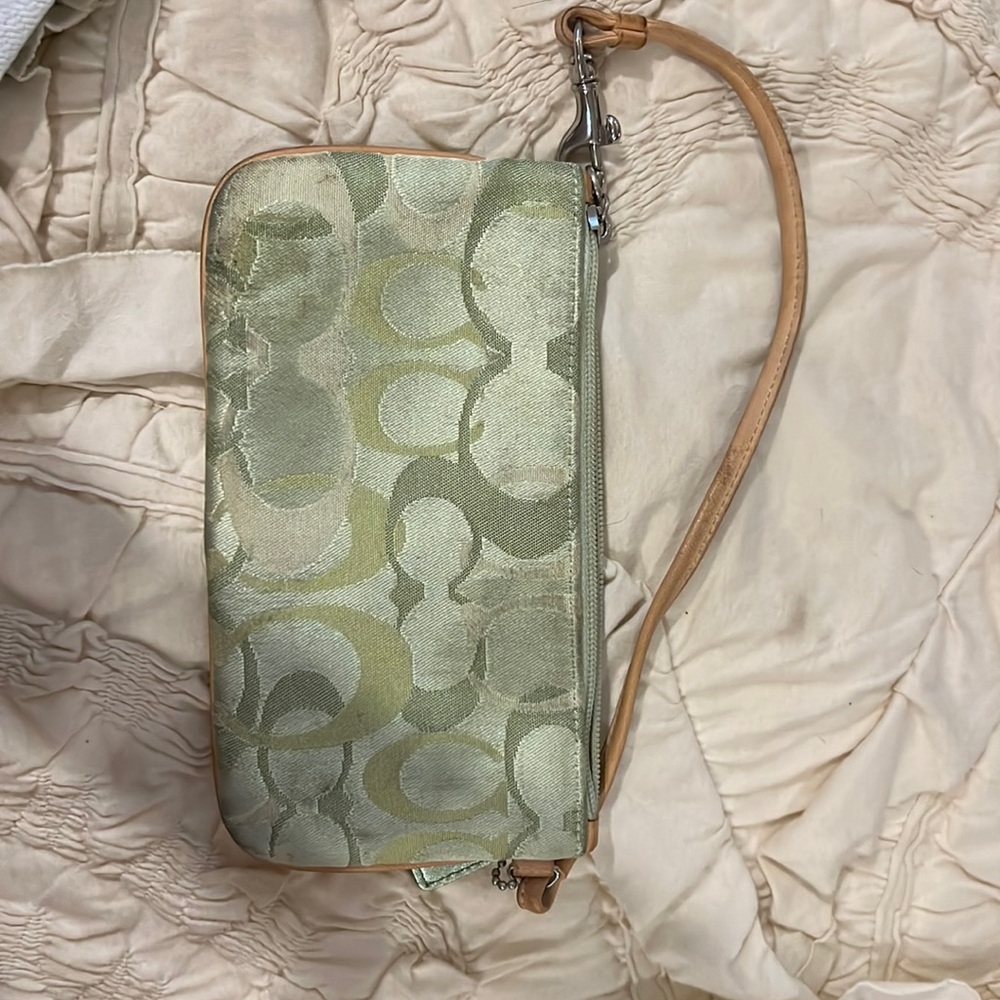 Coach light green canvas with tan leather trim  wristlet